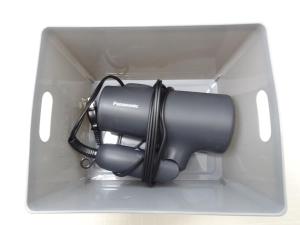 a black speaker sitting in a white box at 豊橋南栄駅徒歩1分 最大9名一棟貸 ホタルヤ Guest House Hotaruya Toyohashi Minami Sakae in Toyohashi