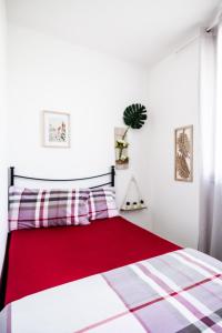 Ένα ή περισσότερα κρεβάτια σε δωμάτιο στο Appartamento Dolce Casa 2