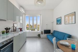 Kuchyň nebo kuchyňský kout v ubytování Baroni D - FREE private parking-wi- fi and A-C