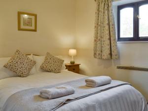 Postel nebo postele na pokoji v ubytování Ross