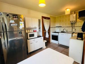 Kuchyň nebo kuchyňský kout v ubytování Casa con orilla de río y vista a los volcanes + 9 fotografií