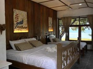 Postel nebo postele na pokoji v ubytování PP Land Beach Eco Resort + 128 fotografií