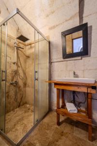 a bathroom with a sink and a shower at Valinor Cappadocia in Ürgüp +249 photos