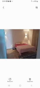 a picture of a bedroom with a bed at Villa des deux frères in Midoun +4 photos