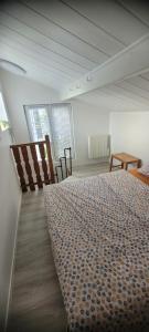 Postel nebo postele na pokoji v ubytování Cocon cosy en plein centre ville proche Paris à 2 pas de la gare