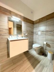 a bathroom with a sink and a toilet at B&B Fior di Feruci 