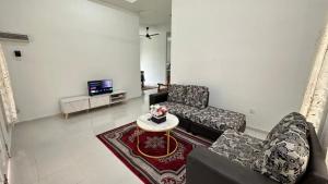 TV a/nebo společenská místnost v ubytování AS Suria Homestay Banglo 1 Tingkat Kubang Kerian