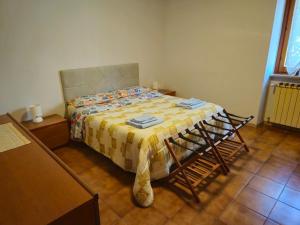 Postel nebo postele na pokoji v ubytování Appartamento Colle Di Roio