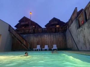 Πισίνα στο ή κοντά στο Le Loticeja