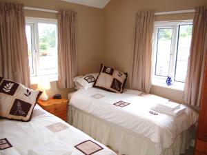 Postel nebo postele na pokoji v ubytování Beech End