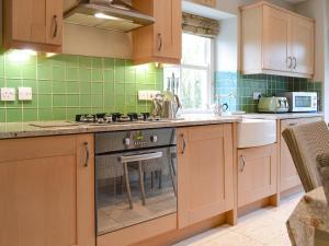 Η κουζίνα ή μικρή κουζίνα στο Bridge House