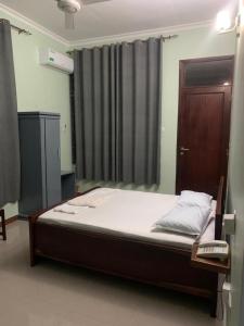 Postel nebo postele na pokoji v ubytování Joleen Safari Park