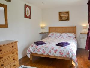 Postel nebo postele na pokoji v ubytování The Garden Barn