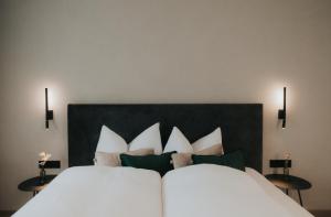 Giường trong phòng chung tại Apart Kraxner