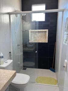 Ένα μπάνιο στο Casa Paracuru