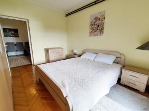 Ένα ή περισσότερα κρεβάτια σε δωμάτιο στο Lana 38