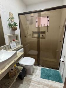 Ένα μπάνιο στο Aconchego de um Lar Hospedagem Domiciliar