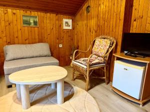 TV a/nebo společenská místnost v ubytování Niya Guest House