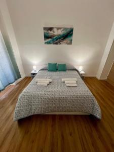 Ένα ή περισσότερα κρεβάτια σε δωμάτιο στο Saffi Rooms