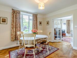 a dining room with a table and chairs at Henrys Retreat in Ingoldsby