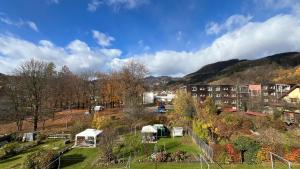 a view of a park with a building and trees at Becci Apartment-Free Parking in Kapfenberg +17 photos