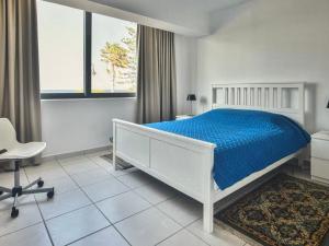 Ένα ή περισσότερα κρεβάτια σε δωμάτιο στο Kos blue & green