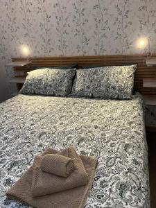 Ένα ή περισσότερα κρεβάτια σε δωμάτιο στο Fioravanti House