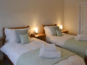 Voodi või voodid majutusasutuse Park Farm Cottage toas