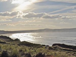 a view of the beach from a bluff at Manor House in Uny Lelant