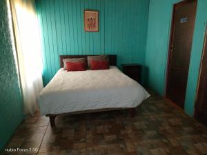 Ένα ή περισσότερα κρεβάτια σε δωμάτιο στο Blue Tavern House