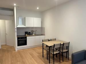 Kuchyň nebo kuchyňský kout v ubytování Le Chapelier