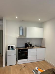 Kuchyň nebo kuchyňský kout v ubytování Le Chapelier + 15 fotografií