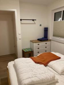 Ένα ή περισσότερα κρεβάτια σε δωμάτιο στο Fewo Paul