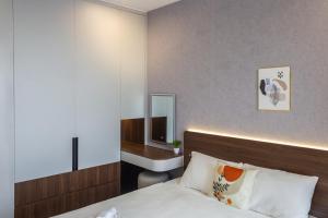 Postel nebo postele na pokoji v ubytování Cobena Home