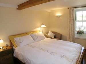 Postel nebo postele na pokoji v ubytování Mouse Castle Barn