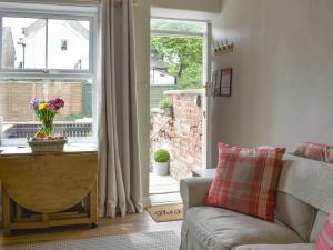 Posezení v ubytování Elizabeth Cottage