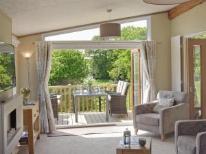 Χώρος καθιστικού στο Rockville Lodge - Uk2503