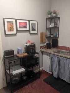 Η κουζίνα ή μικρή κουζίνα στο Studio flat - An Bonnan Bui