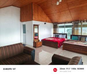 Ένα ή περισσότερα κρεβάτια σε δωμάτιο στο Malsha Bunglow +6 φωτογραφίες