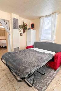a large bed in a room with at The Cottage in Panguitch