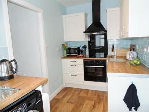 Kuchyň nebo kuchyňský kout v ubytování Gracedieu + 14 fotografií