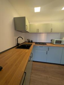 Kuchyň nebo kuchyňský kout v ubytování Appartamento Dar Per