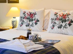 Postel nebo postele na pokoji v ubytování Coulags Croft + 13 fotografií