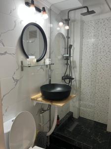 Ένα μπάνιο στο Beatrice Residence Centru Vechi