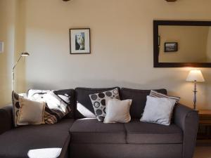 Et opholdsområde på Oak Barn Cottage