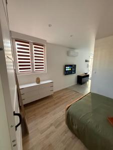 Postel nebo postele na pokoji v ubytování Appartement 2 pièces neuf Toul proche gare