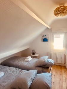 Et opholdsområde på Maison avec piscine chauffée toute l'année