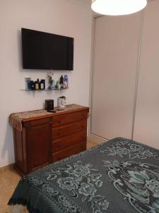 Ένα ή περισσότερα κρεβάτια σε δωμάτιο στο CENTRO,Casino,MAR Y PLAYA, COCHERA,opcional, 2 ambientes equipados 3 pers 150MTS DEL MAR +11 φωτογραφίες