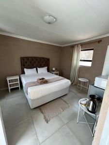 Postel nebo postele na pokoji v ubytování Riverview Pool Resort and Lodge