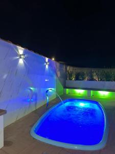 Bazén v ubytování J Morelli s - A 2 Minutos dos Melhores Parques de Olímpia nebo v jeho okolí